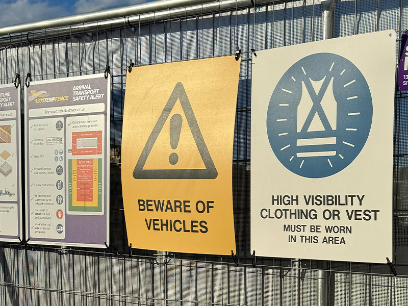 various-site-safety-signage-mounted-to-temporary-fencing