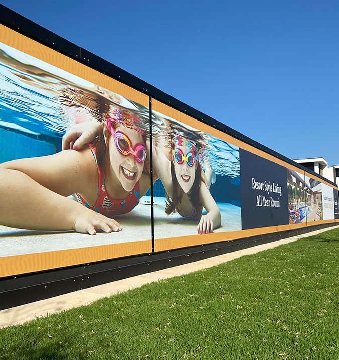 Vinyl banners on hoarding for a construction site